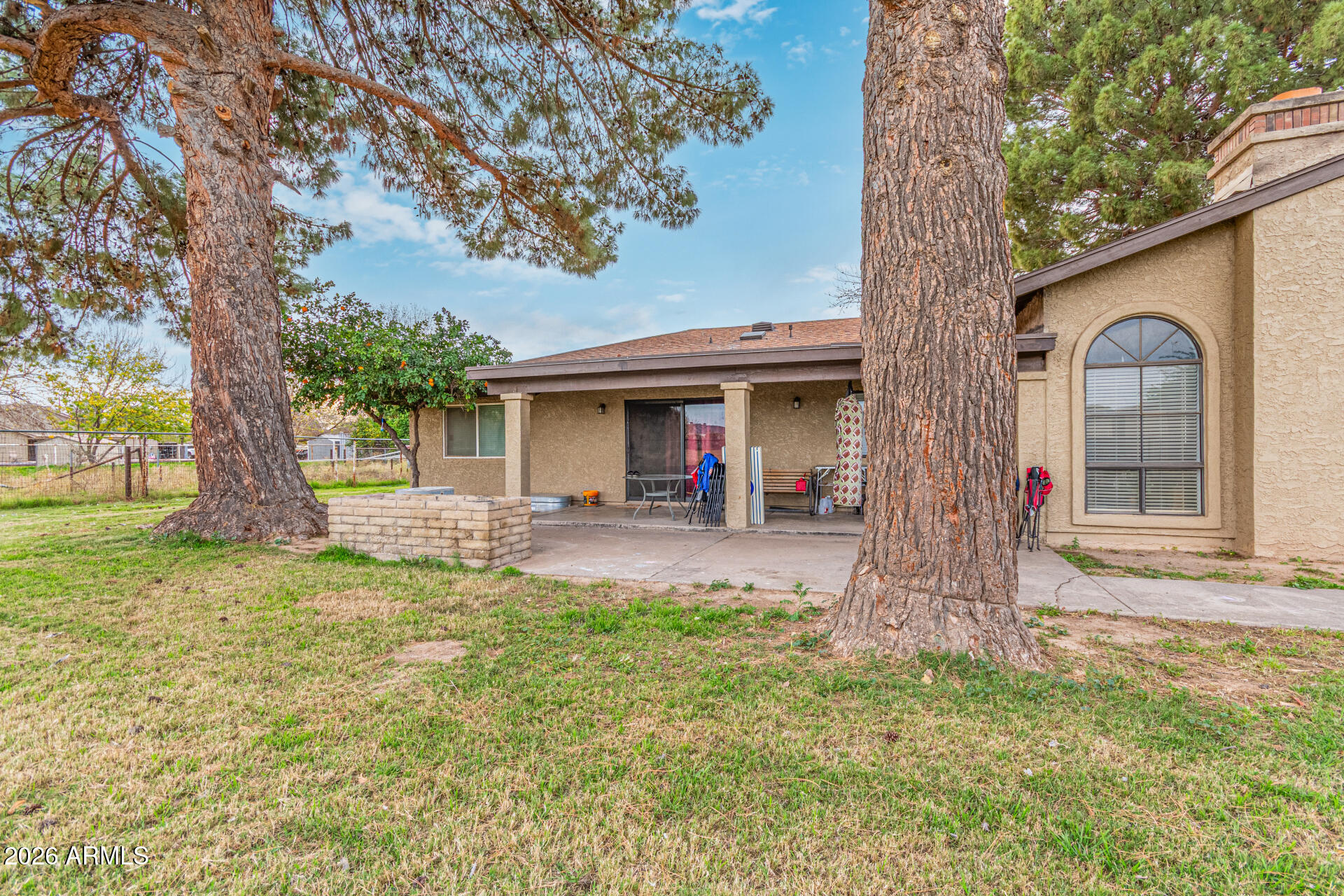 21613 South 154th Street Gilbert, AZ 85298 - Photo 54 of 57 a view of a house with backyard and a tree