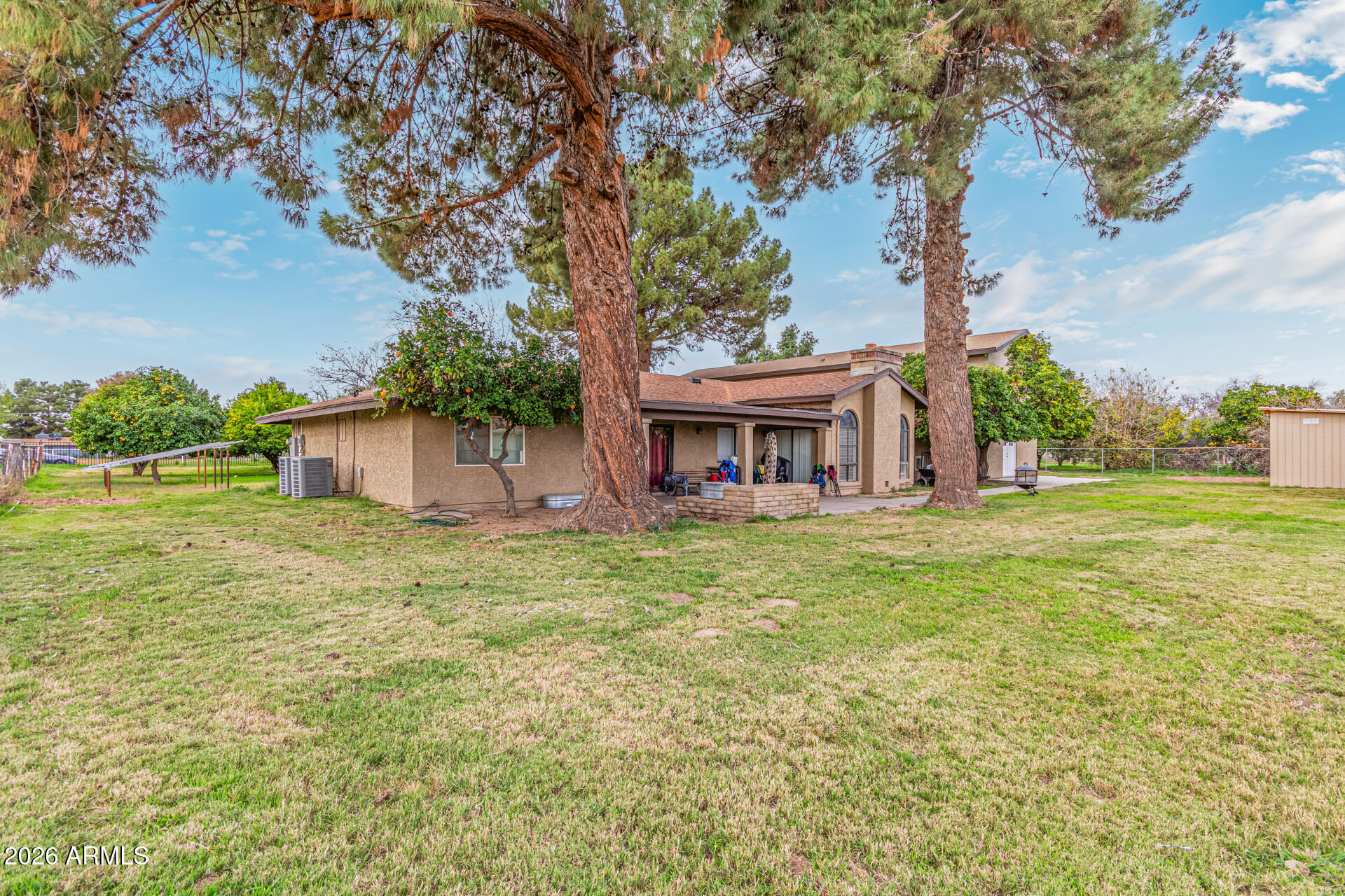 21613 South 154th Street Gilbert, AZ 85298 - Photo 56 of 57 a view of a house with backyard and garden