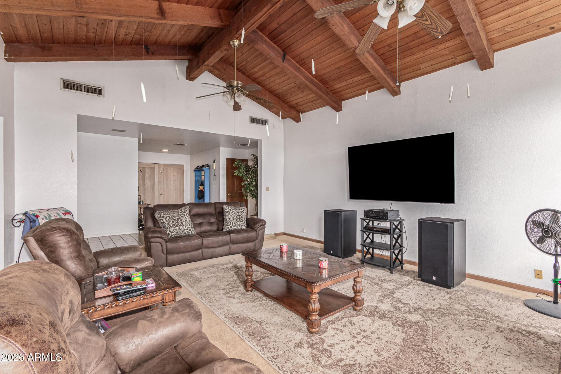 21613 South 154th Street Gilbert, AZ 85298 - Photo 9 of 57 a living room with furniture and a flat screen tv