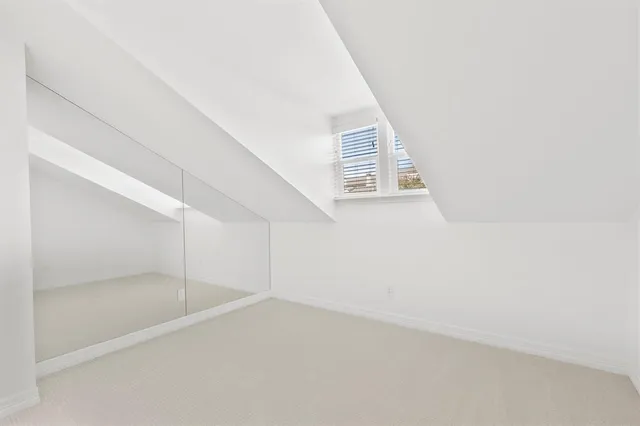 a view of a small space with white walls