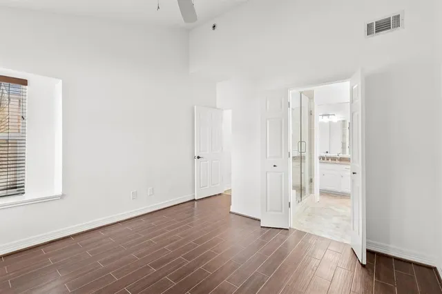 a view of wooden floor in an empty room