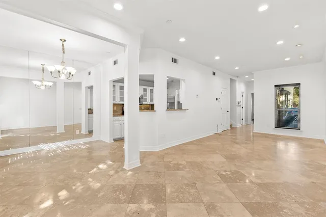 a view of a big room with a chandelier