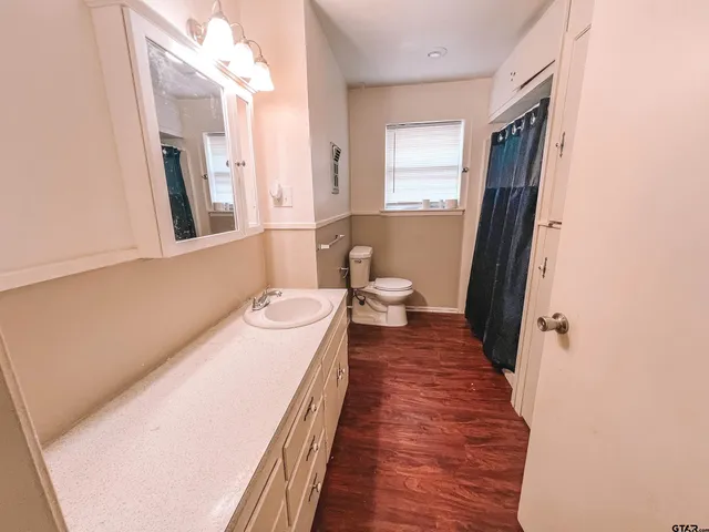 a view of a bedroom from a hallway