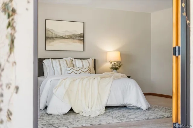 a living room with furniture and window