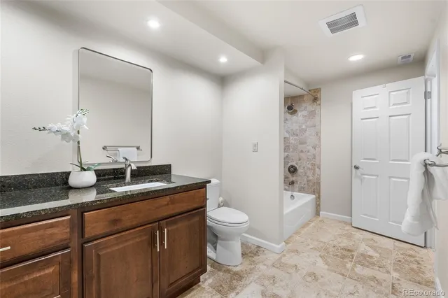 a utility room with sink dryer and washer