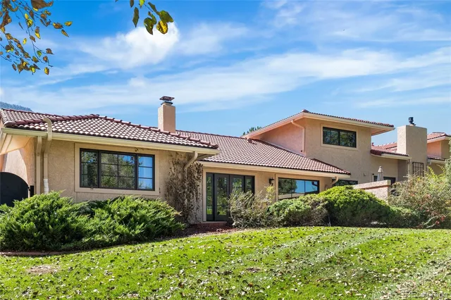 a view of a city with mountains in the background