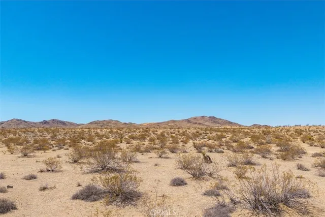a view of mountain view and mountains