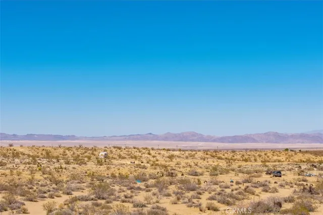 a view of an lake with a mountain