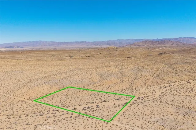 a view of an ocean and mountain