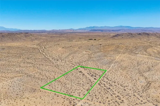 a view of ocean and mountain