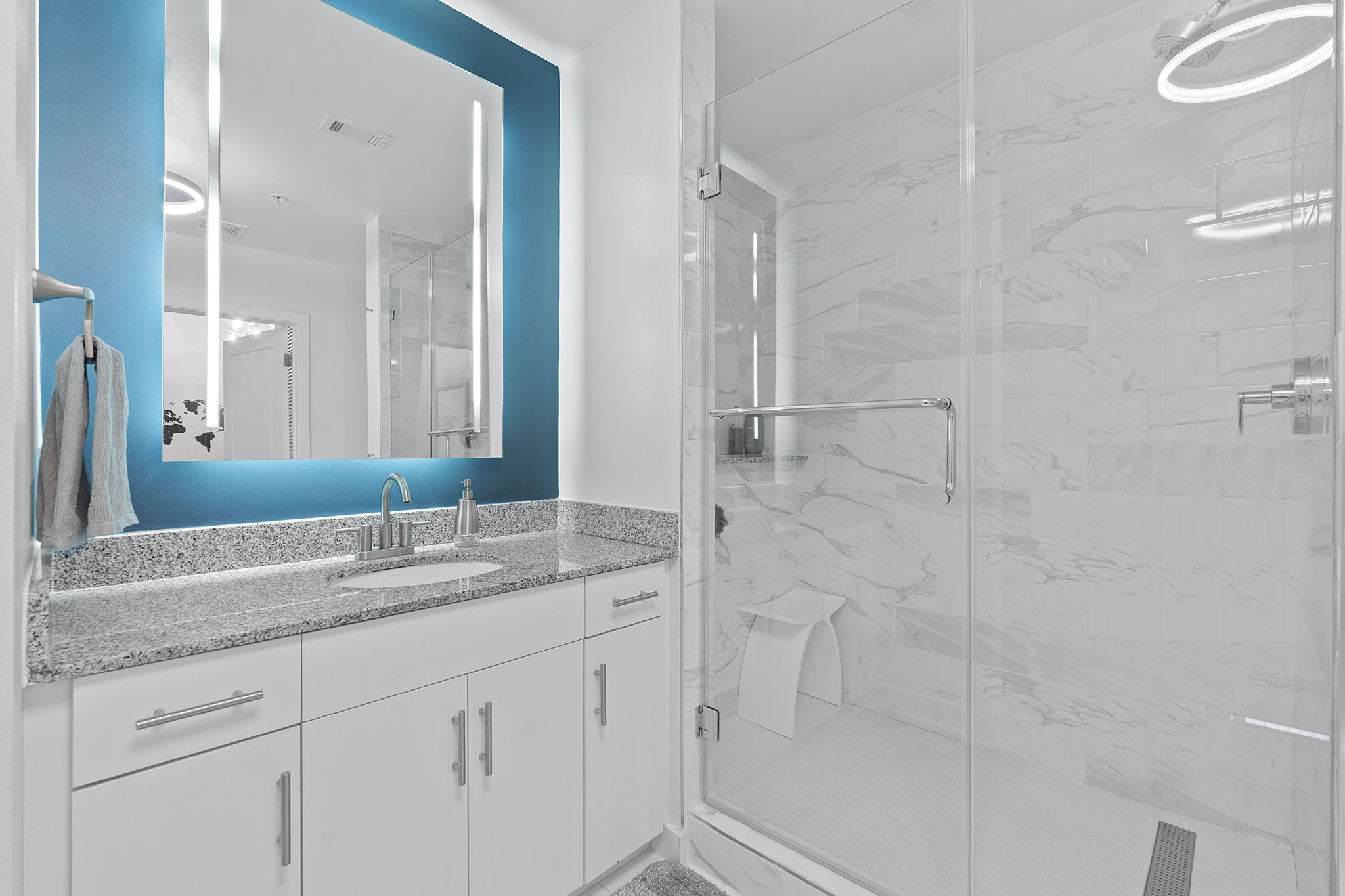 360 Nueces Street, Unit 1007 Austin, TX 78701 - Photo 22 of 40 Full bathroom with vanity and a marble finish shower