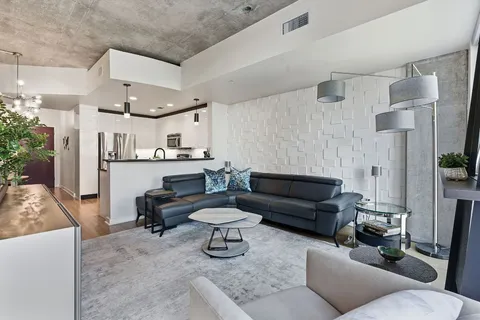 a living room with furniture and a couch