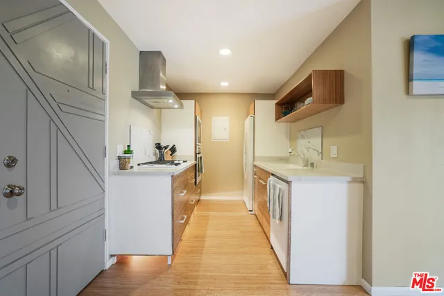a view of a kitchen cabinets and a kitchen