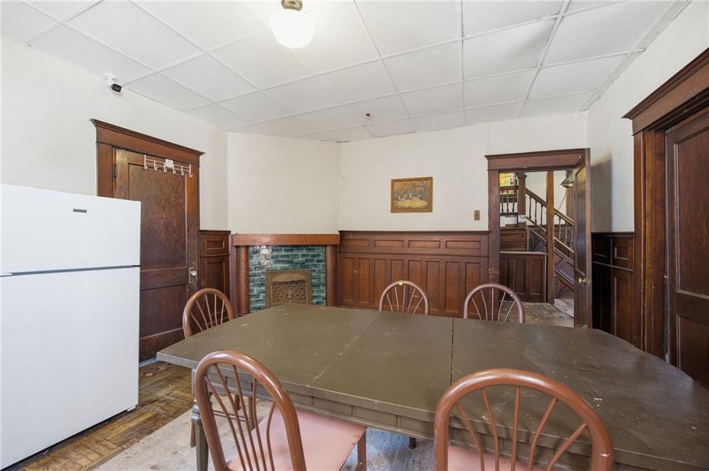 1712 Termon Avenue Pittsburgh, PA 15212 - Photo 16 of 38 a view of a dining room with furniture a chandelier and window