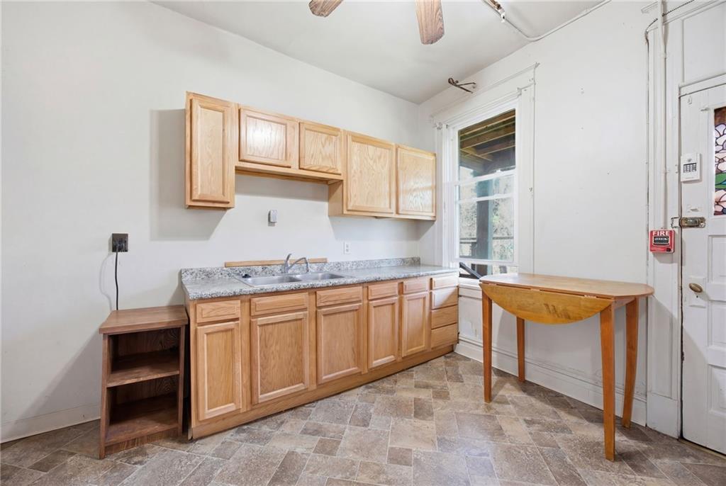 1712 Termon Avenue Pittsburgh, PA 15212 - Photo 18 of 38 a kitchen that has a sink and a stove
