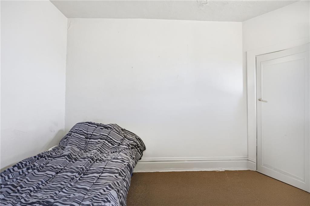 1712 Termon Avenue Pittsburgh, PA 15212 - Photo 29 of 38 a view of small space with racks on the wall