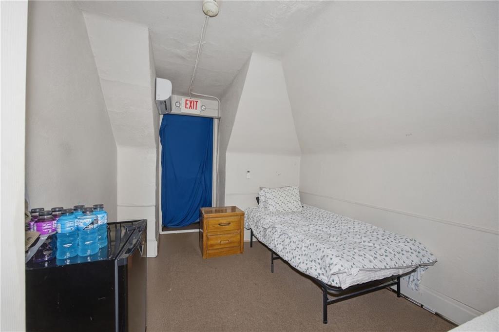 1712 Termon Avenue Pittsburgh, PA 15212 - Photo 35 of 38 a room with a table and chair
