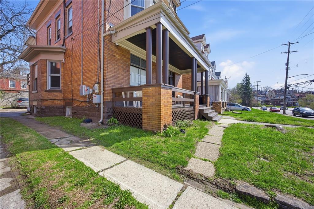 1712 Termon Avenue Pittsburgh, PA 15212 - Photo 4 of 38 a view of a house with a yard