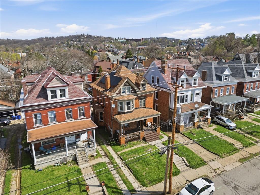 1712 Termon Avenue Pittsburgh, PA 15212 - Photo 9 of 38 an aerial view of residential houses with outdoor space and trees