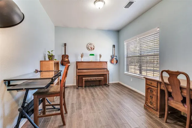 a room with furniture and a window