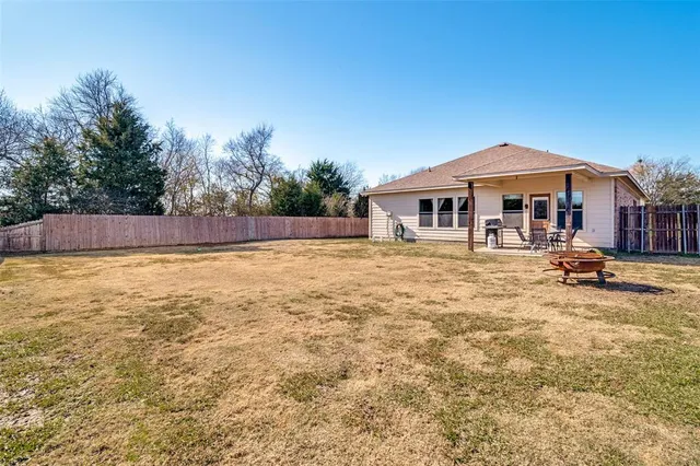 a view of a house with swimming pool and porch
