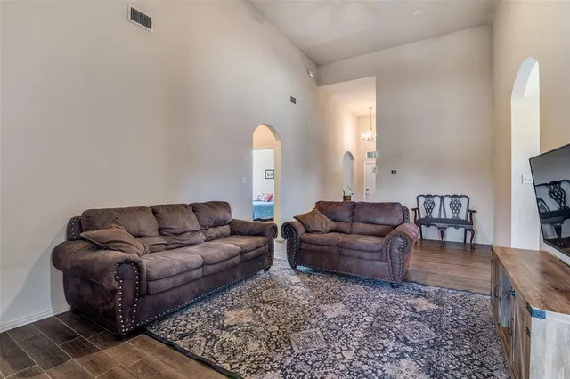 a living room with furniture and a couch