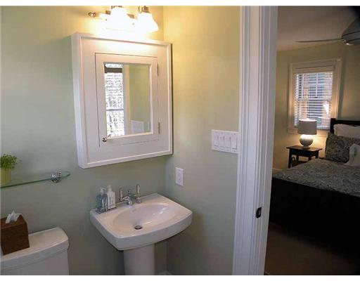 3 Indian Spring Road Rowayton, CT 06853 - Photo 15 of 20 a bathroom with a sink and a mirror