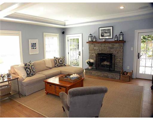 3 Indian Spring Road Rowayton, CT 06853 - Photo 4 of 20 a living room with furniture a window and a fireplace