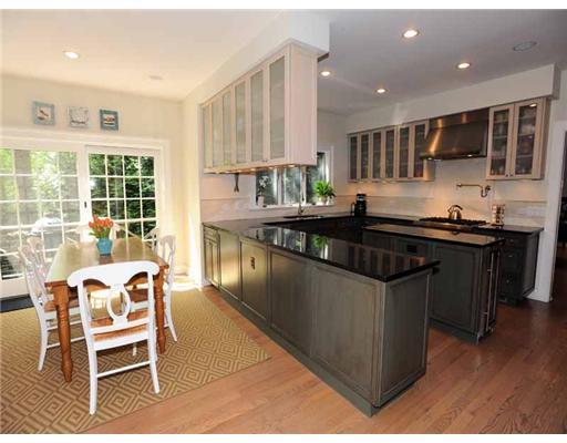 3 Indian Spring Road Rowayton, CT 06853 - Photo 7 of 20 a kitchen with stainless steel appliances granite countertop a stove a sink and a microwave
