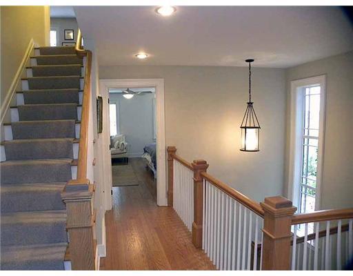 3 Indian Spring Road Rowayton, CT 06853 - Photo 10 of 20 a view of a hallway with wooden floor and staircase