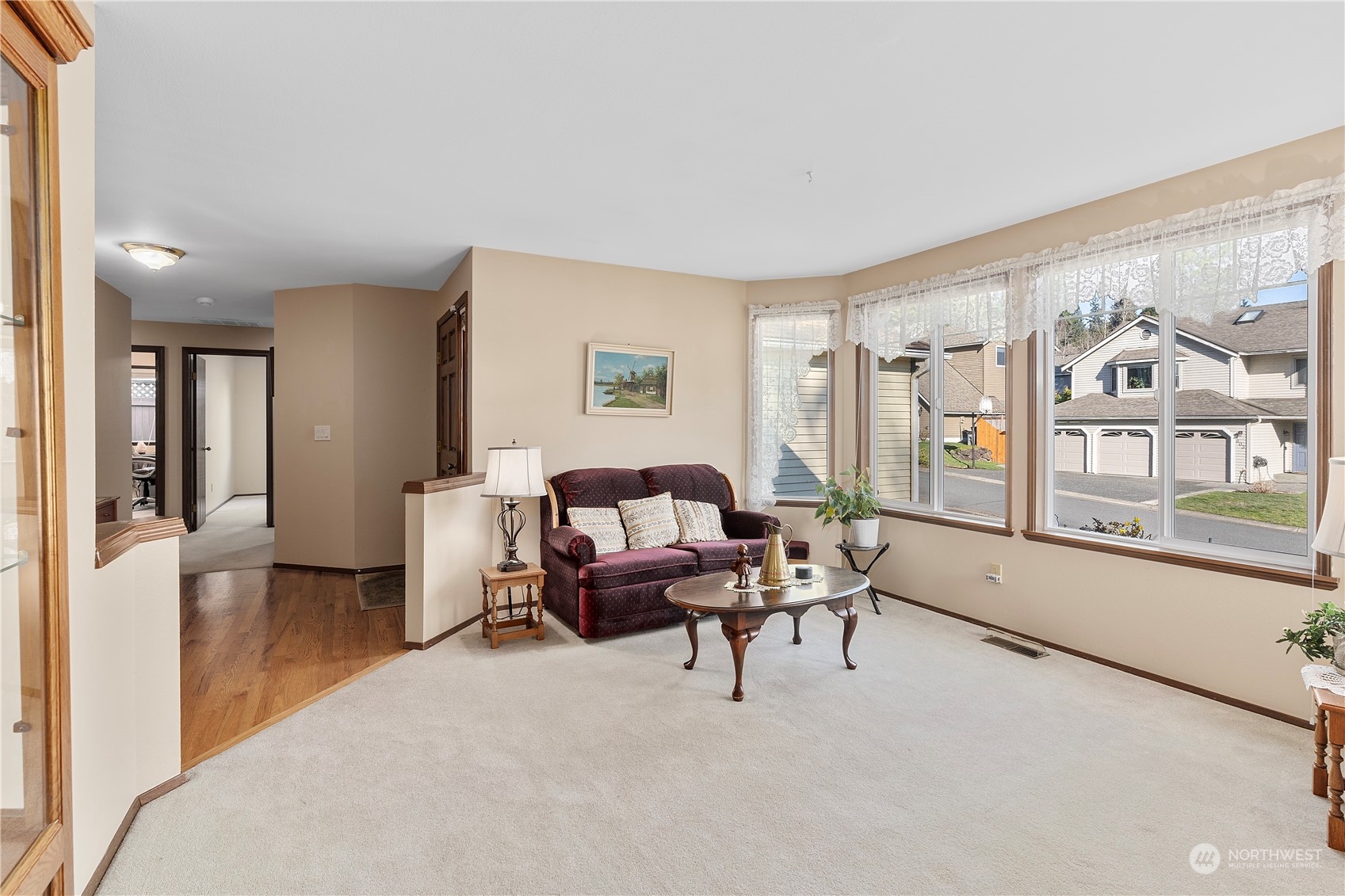 606 225th Place Southeast Bothell, WA 98021 - Photo 17 of 38 a living room with furniture and a large window