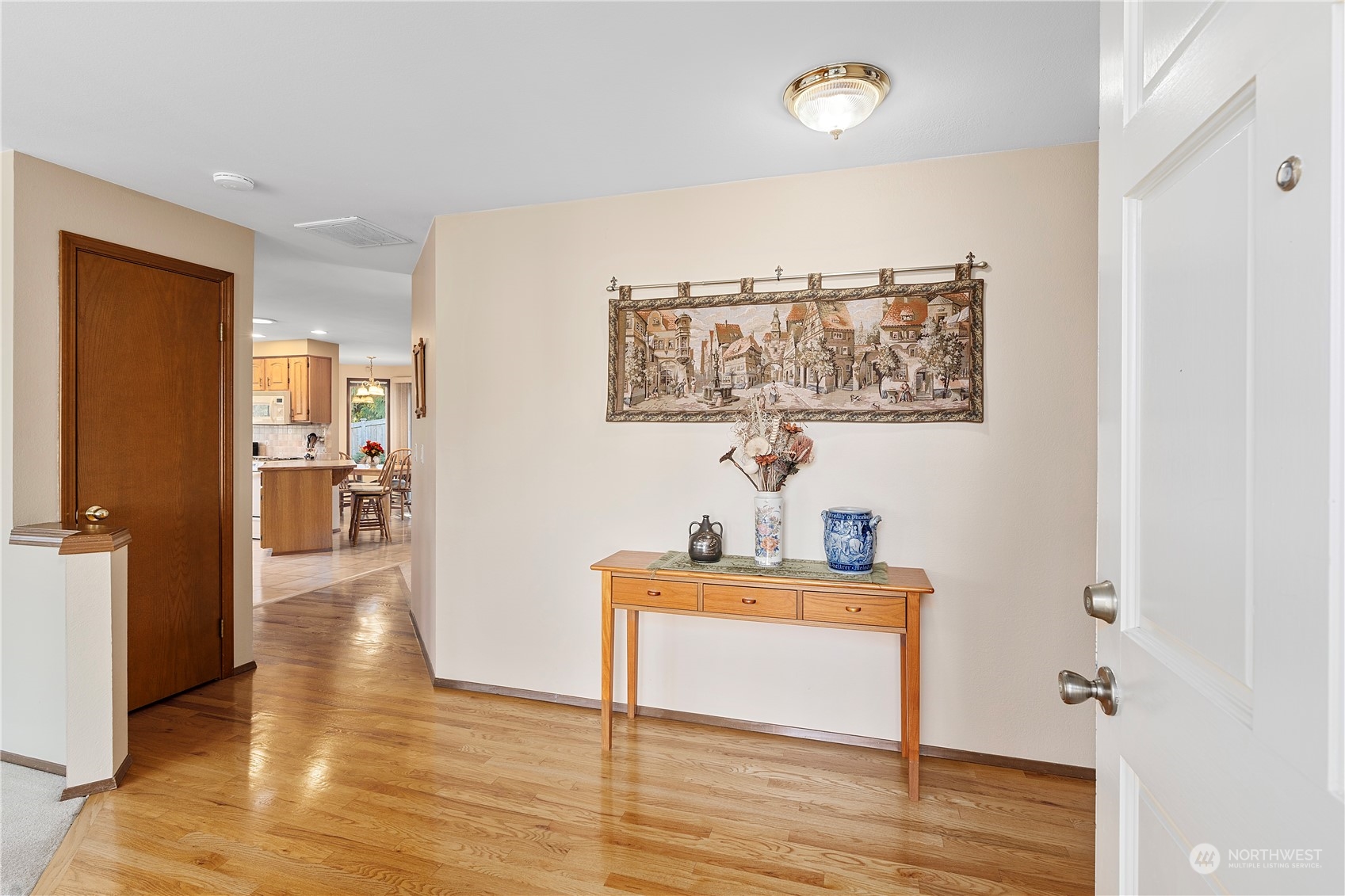 606 225th Place Southeast Bothell, WA 98021 - Photo 3 of 38 a room with a table and chairs