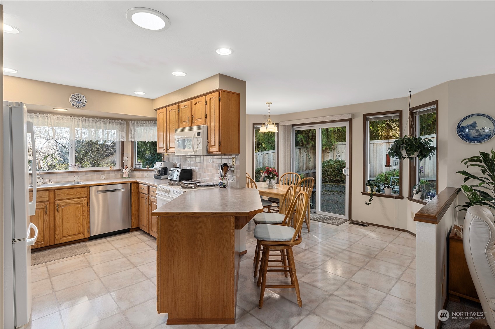 606 225th Place Southeast Bothell, WA 98021 - Photo 6 of 38 a kitchen with counter top space and appliances