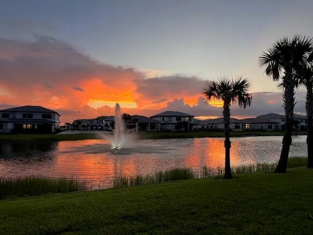 a view of a lake with a big yard