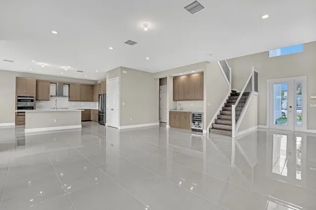 a view of kitchen with furniture and wooden floor