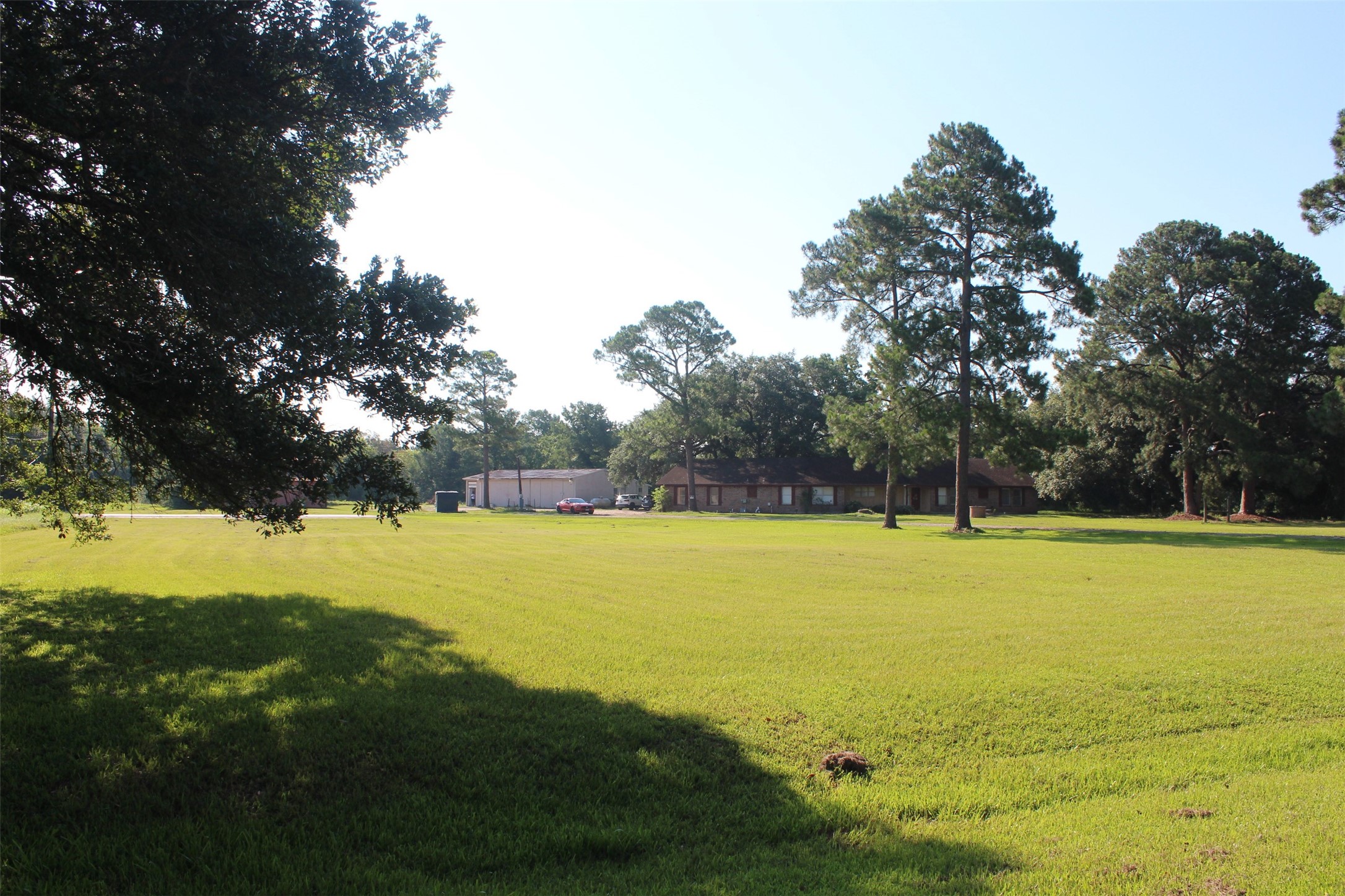 4531 Curry Street Manvel, TX 77578 - Photo 20 of 24 a view of an ocean yard and trees