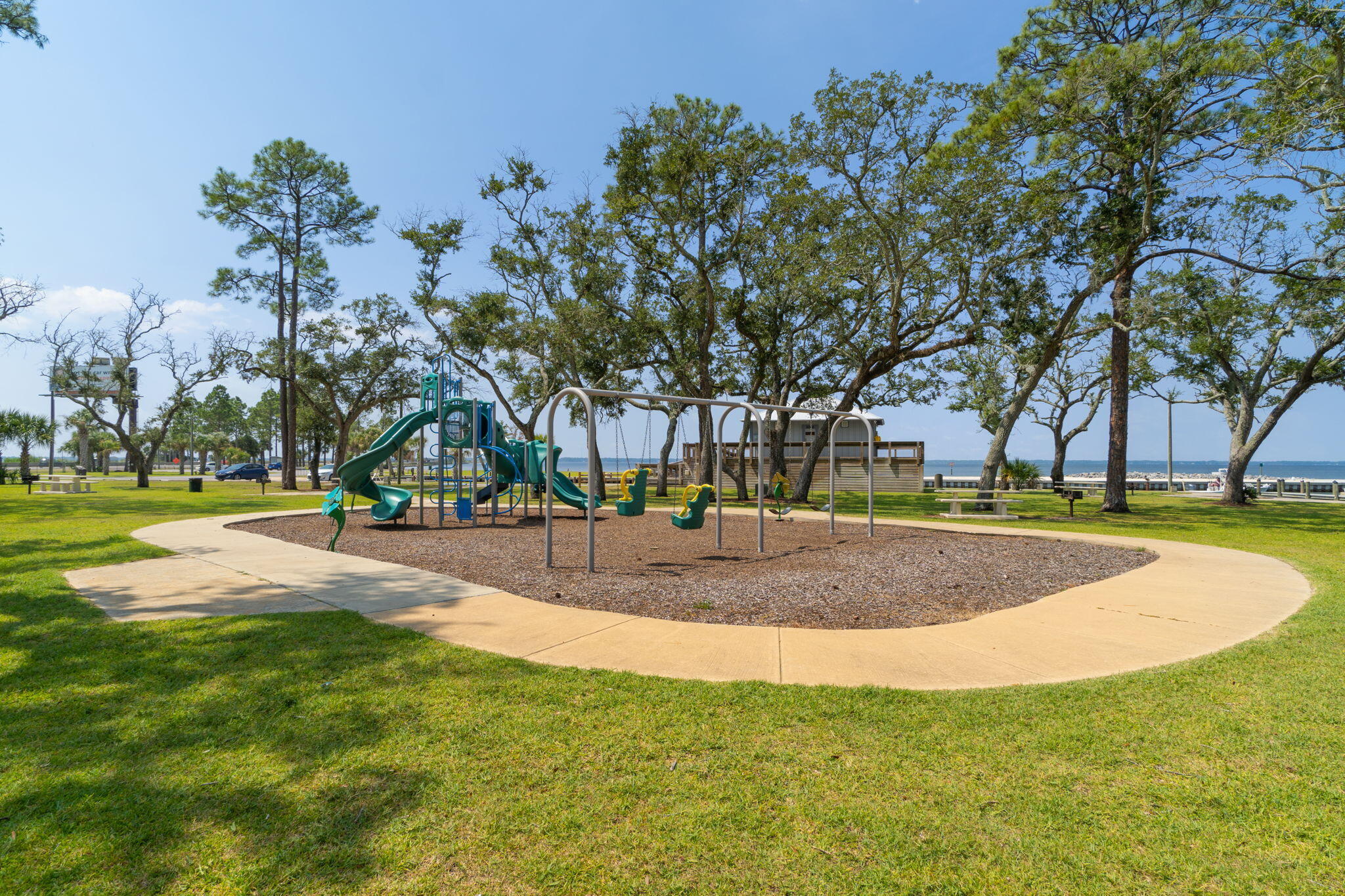 2623 Bay Grove Road Freeport, FL 32439 - Photo 38 of 56 a view of a playground with basketball court