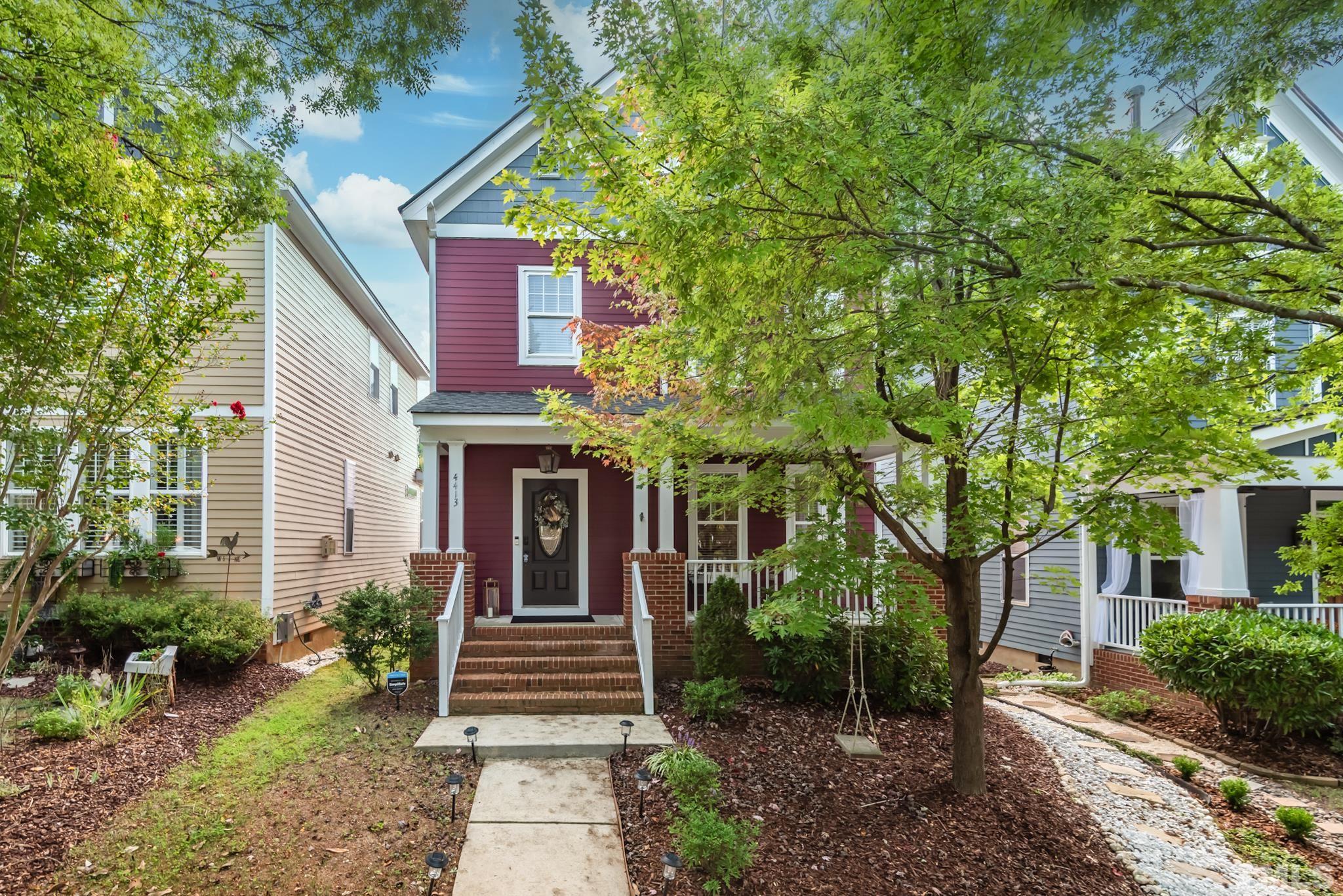 4413 All Points View Way Raleigh, NC 27614 - Photo 1 of 51 a front view of a house with a garden