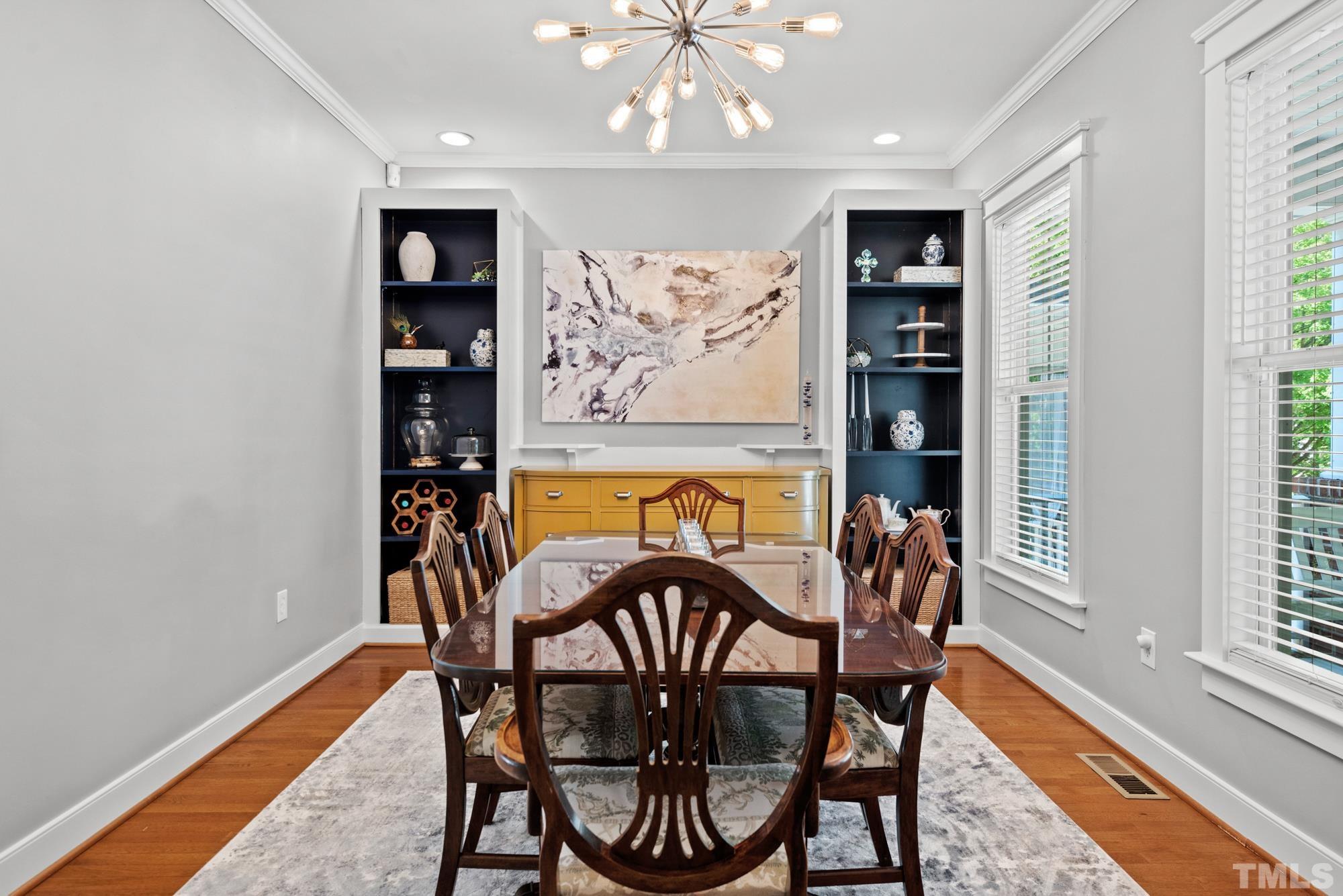 4413 All Points View Way Raleigh, NC 27614 - Photo 15 of 51 a view of a dining room with furniture and chandelier