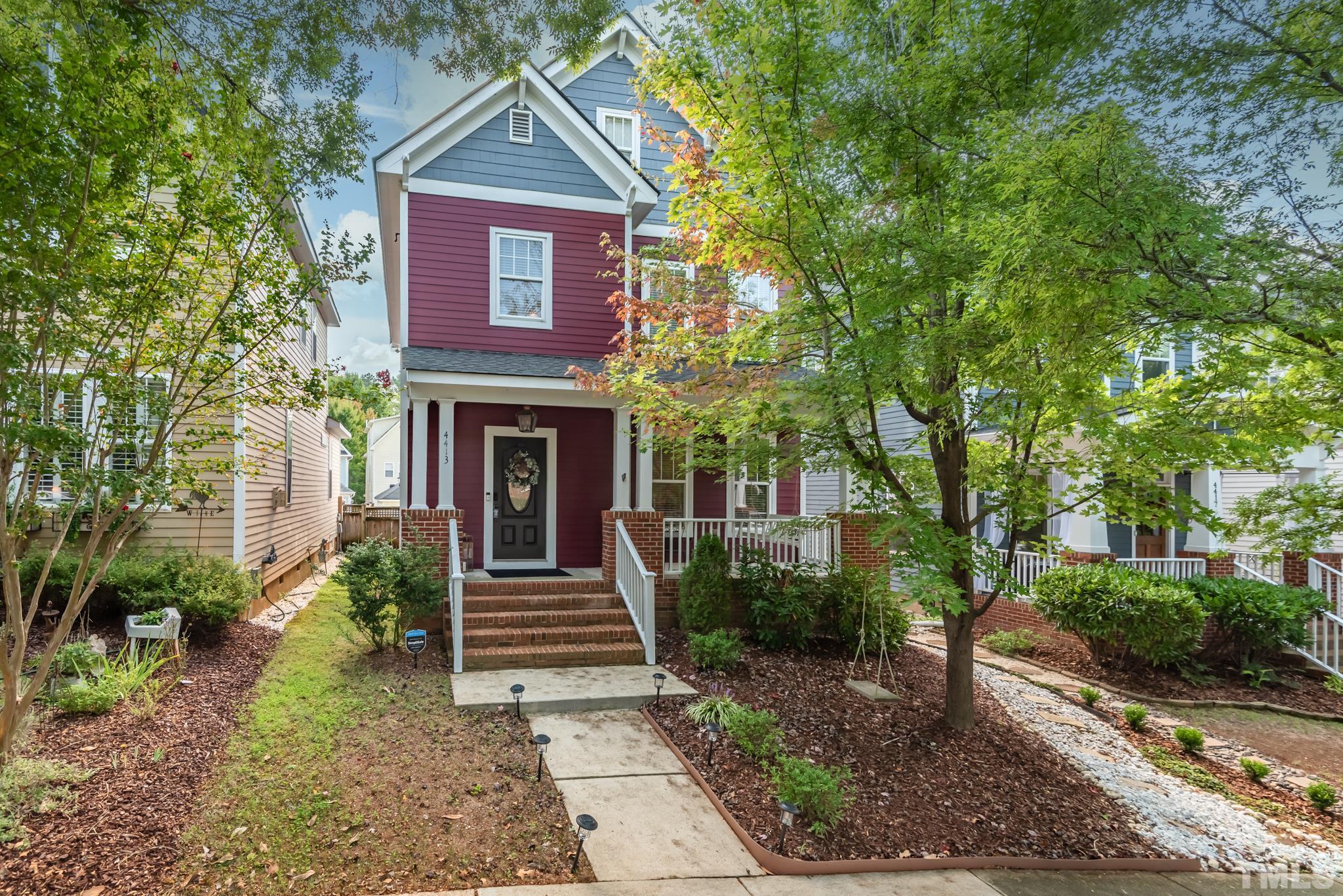 4413 All Points View Way Raleigh, NC 27614 - Photo 36 of 51 a front view of a house with garden