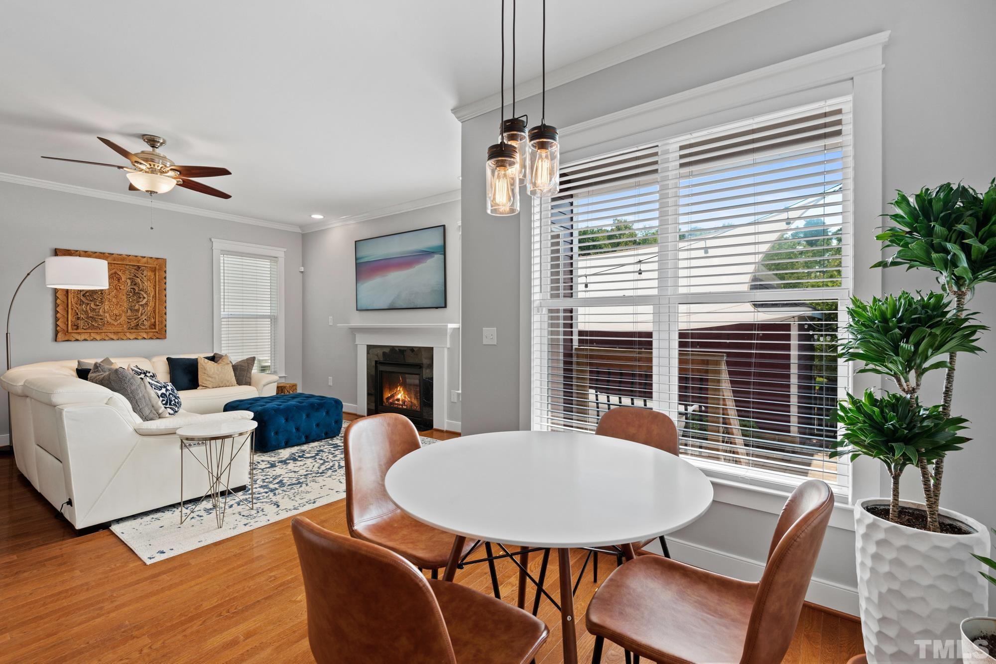 4413 All Points View Way Raleigh, NC 27614 - Photo 9 of 51 a view of a livingroom with furniture window and wooden floor