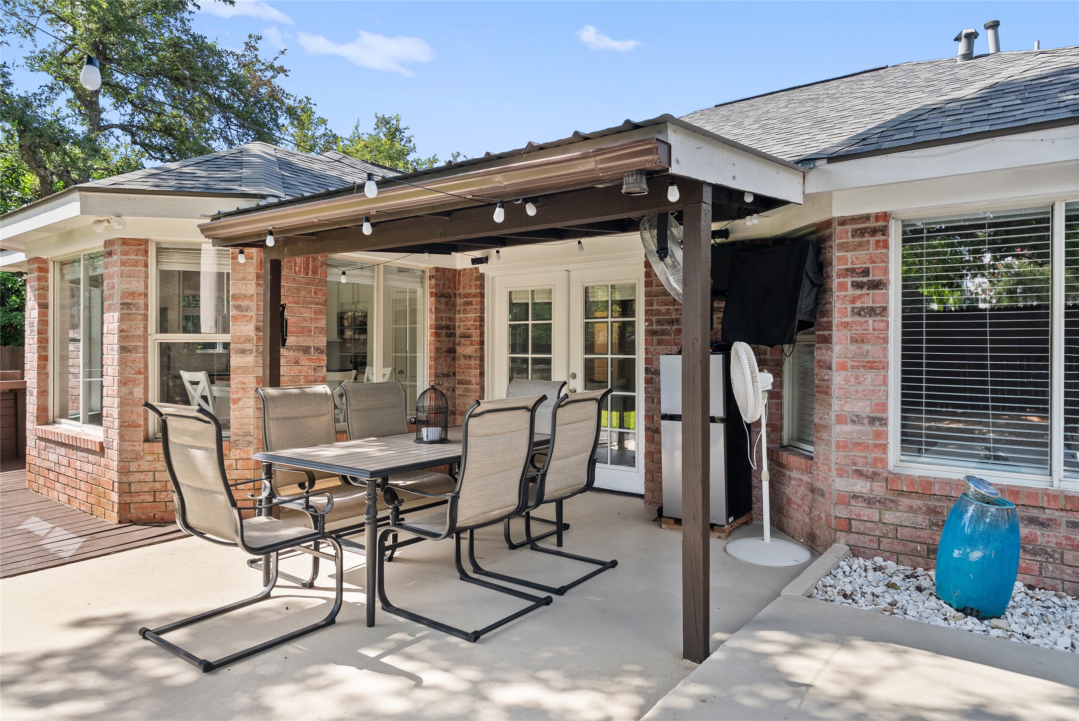 9024 Heiden Lane Austin, TX 78749 - Photo 5 of 33 The covered patio provides a shaded outdoor space to sit back, stay out of the midday sun, and look out over the entire backyard setup