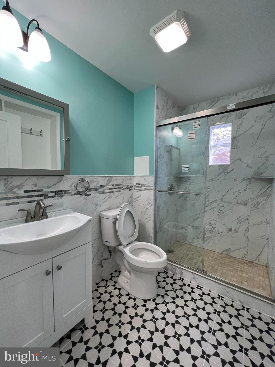 623 South 4th Street, Unit 3 Philadelphia, PA 19147 - Photo 6 of 11 a bathroom with a sink toilet and shower