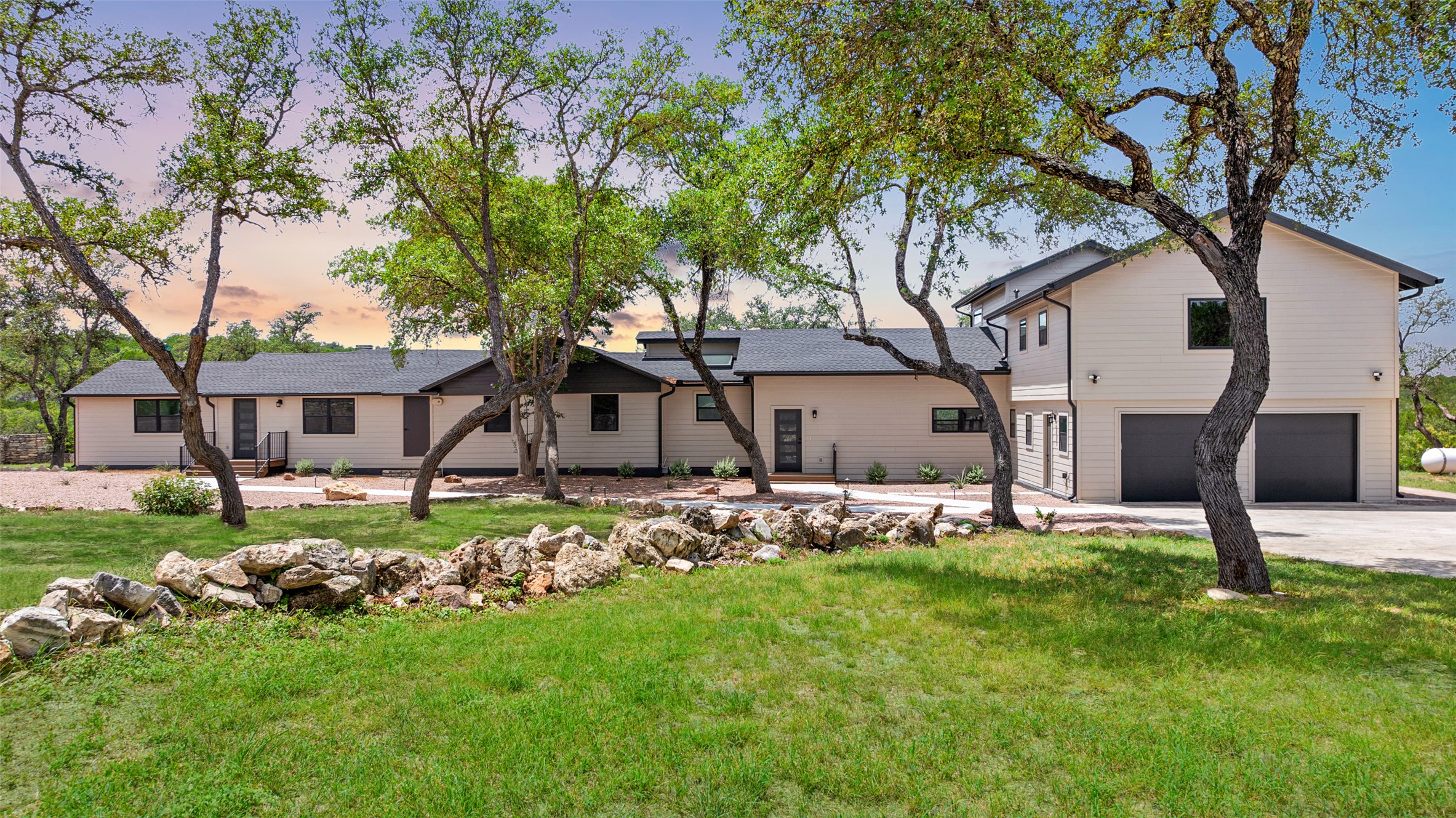 Welcome to this exceptional private Hill Country retreat on 2.5 acres, fully remodeled and offering panoramic views with three distinct residences within one estate.