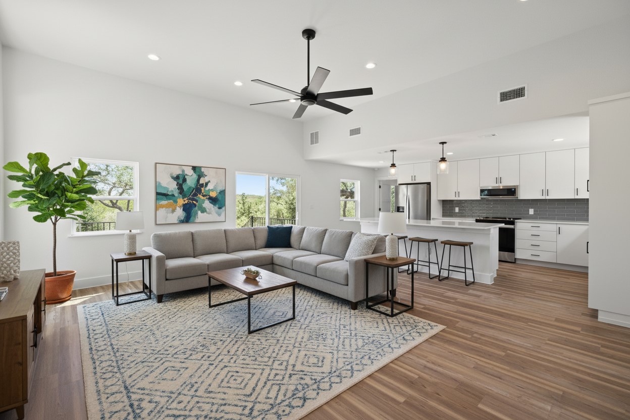11151 Highway 71 Spicewood, TX 78669 - Photo 18 of 38 Middle Residence - Living room featuring ceiling fan, light wood-style flooring, and recessed lighting. *Photo has been virtually staged.
