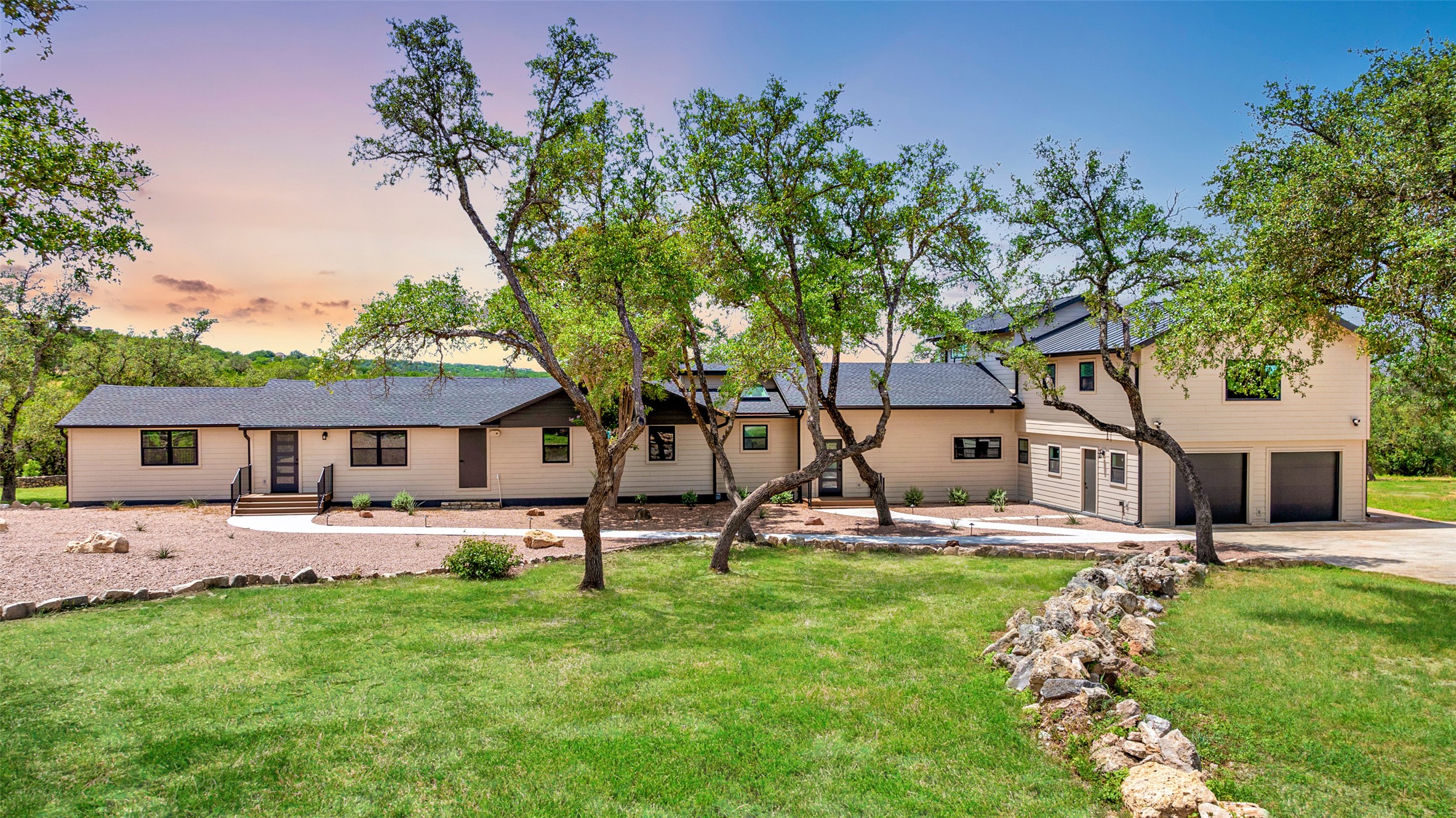 11151 Highway 71 Spicewood, TX 78669 - Photo 36 of 38 front view of a house with a yard