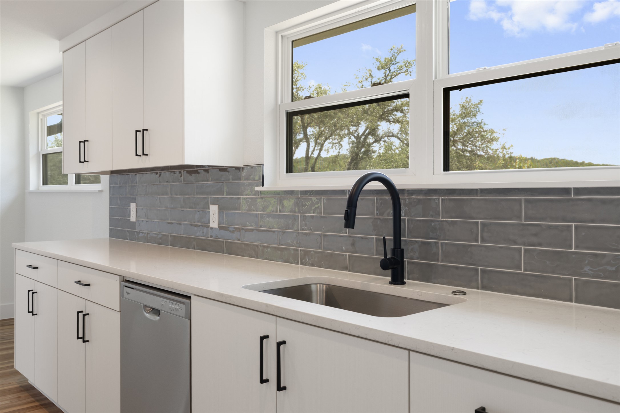 11151 Highway 71 Spicewood, TX 78669 - Photo 7 of 38 First Residence – Kitchen window overlooking sweeping Hill Country views.