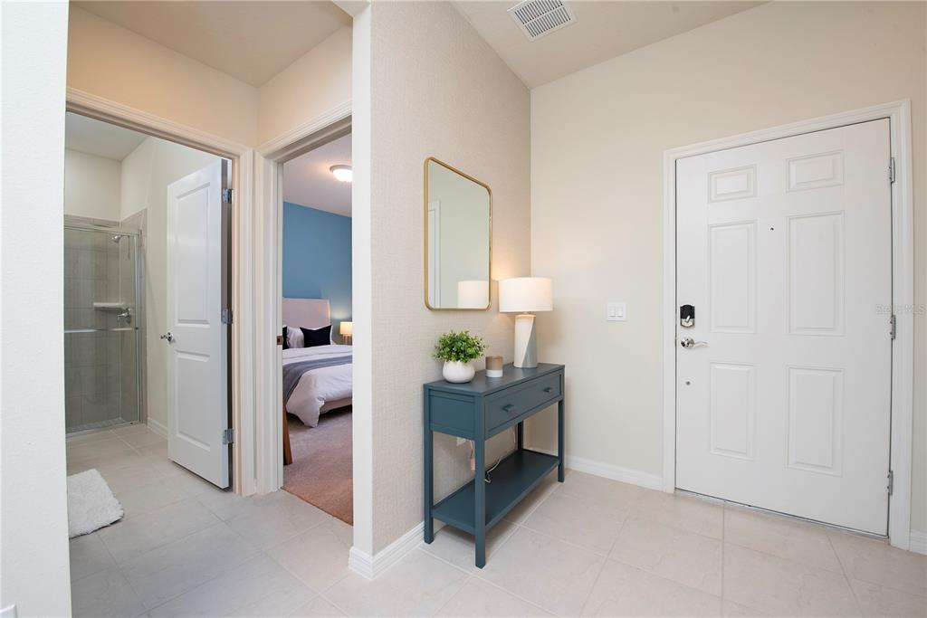 126 Jetty Way Davenport, FL 33897 - Photo 13 of 52 a view of an entryway with dining area