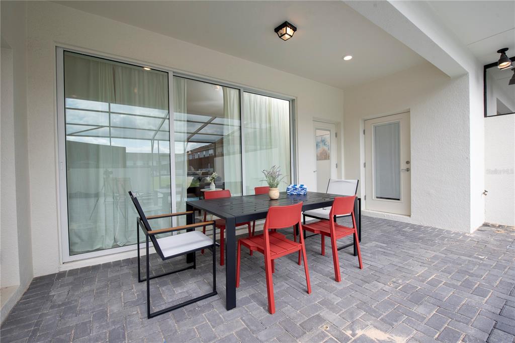 126 Jetty Way Davenport, FL 33897 - Photo 21 of 52 a view of a dining room with furniture window and outside view