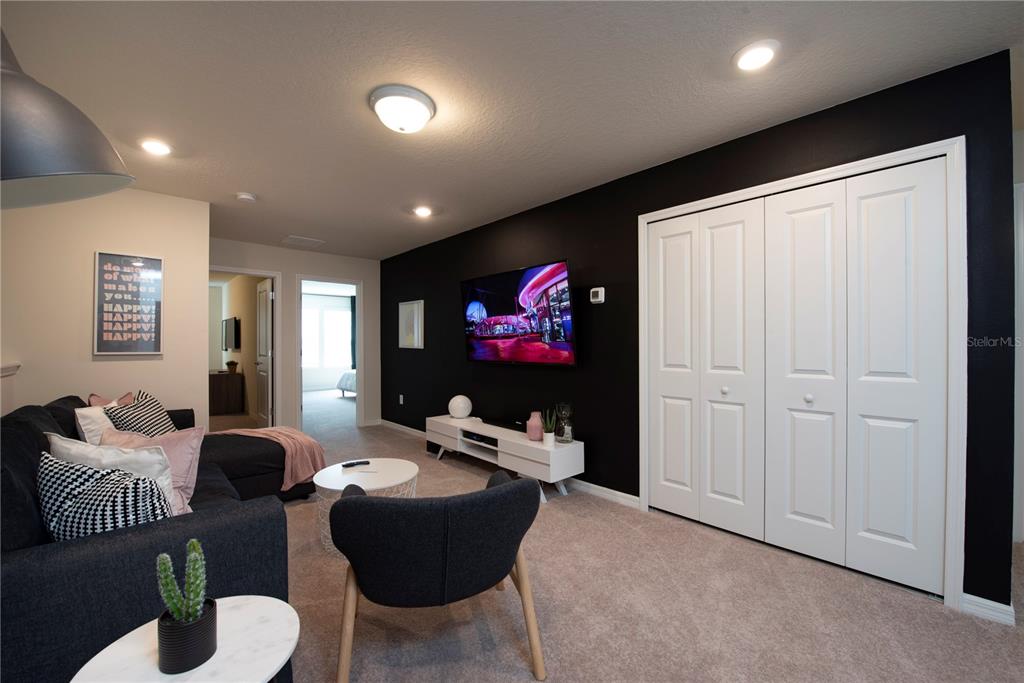 126 Jetty Way Davenport, FL 33897 - Photo 23 of 52 a living room with furniture